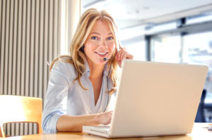 Woman behind a laptop