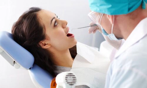 Woman Receiving A Dental Cleaning