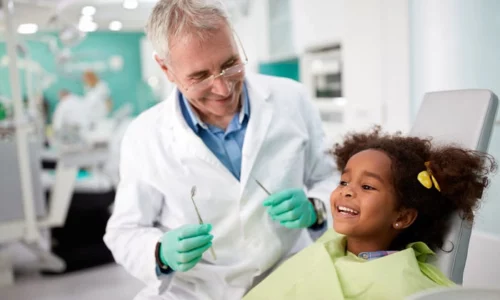 Child Receiving A Dental Cleaning