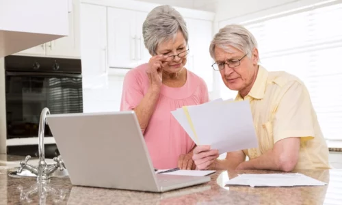 Senior Couple Reviewing Paperwork