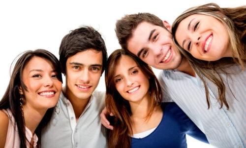 Group Of Smiling Teenagers / Young Adults