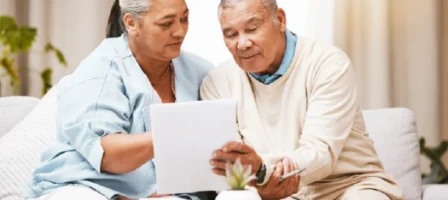 Older Couple Reviewing Documents