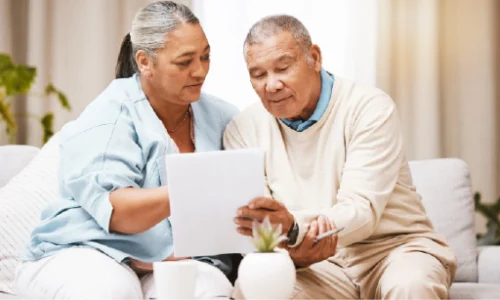 Older Couple Reviewing Documents